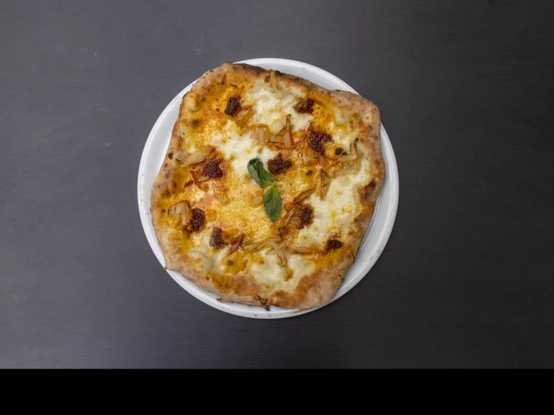 Pizzas a domicilio en Pizzería La Tirana